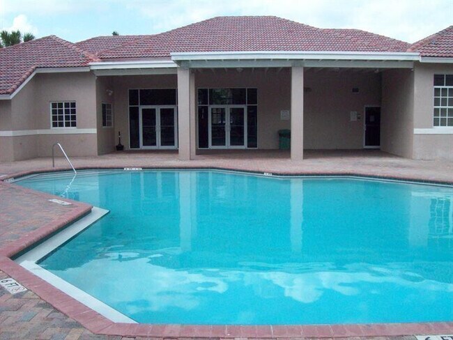 Building Photo - 3241 Sabal Palm Manor