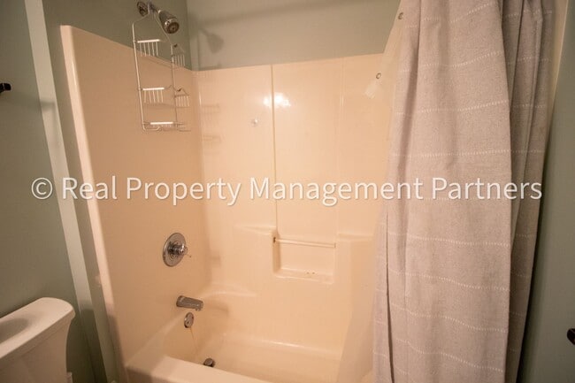 Building Photo - Spacious 3BR Townhome in Lowell | Nature Views & Maintenance-Free Living