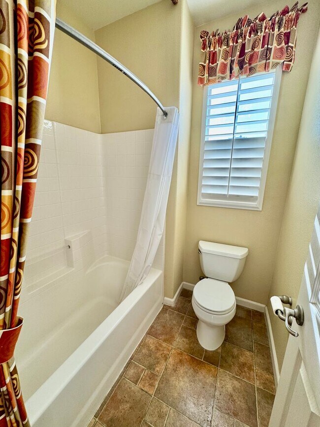 Building Photo - Located in a peaceful and well-maintained senior community, this spacious 3-bedroom, 3.5-bath Plu...