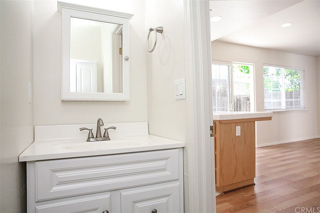 Half bath on the main level with lots of storage on both sides. New fixtures. - 3051 Augusta St