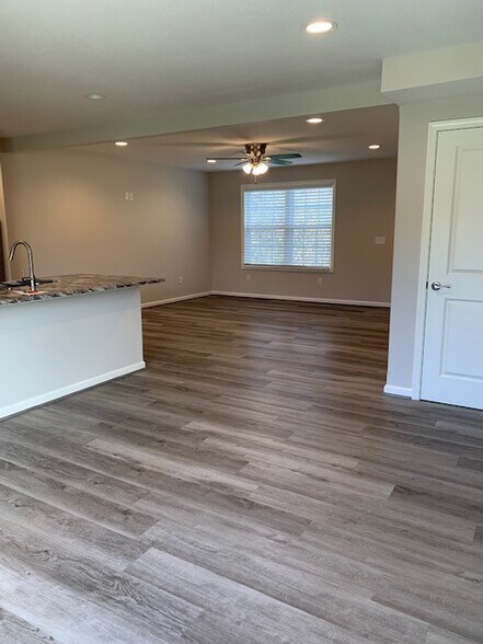 Living, dining, kitchen - 6072 Herons Cir