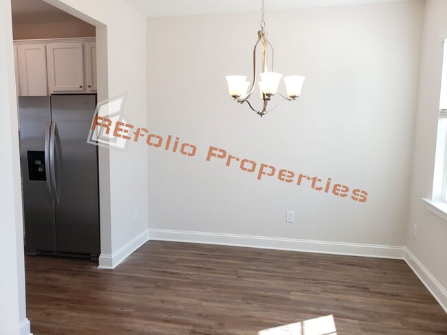 Building Photo - Charming 4 Bedroom, 2.5 Bath, 2-Car Garage...