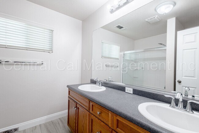 Building Photo - 4 Bedroom/2 Bath Home with Solar - $2695 p...
