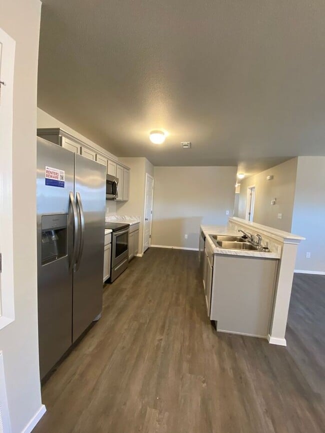 Building Photo - Available Now! Spacious 3-Bedroom, 2-Bath Duplex in Lawlis Ranch with Open-Concept Living