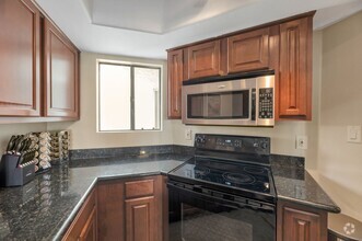 Building Photo - charming 2-bedroom, 2.5-bathroom condo wit...