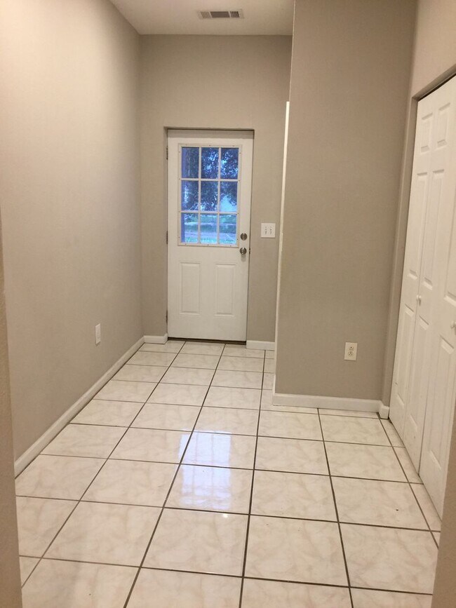 Building Photo - THREE BEDROOMS AND A TWO CAR GARAGE