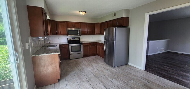 Building Photo - 3Bed/2Bath Duplex Near KU MED Available Soon!