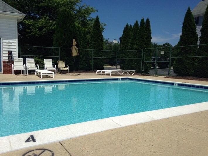 Community pool and fitness center. - 501 Constellation Square SE