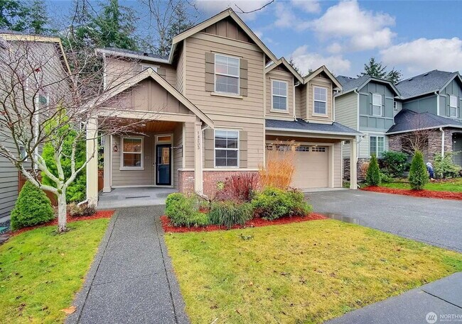 Building Photo - Welcome home to this open concept 5 bedroom home in Tehaleh.