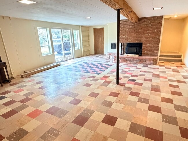 Building Photo - Country like setting! Spacious 3+ bed/ 1.5 bath house with garage, large yard, private deck and a...