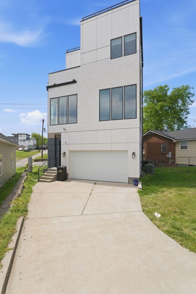 Building Photo - Beautiful 3-BR Property with Rooftop Deck!