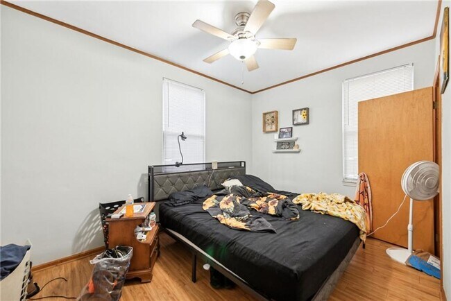 Building Photo - Bright and Roomy 6-Bedroom in McKees Rocks with Garage