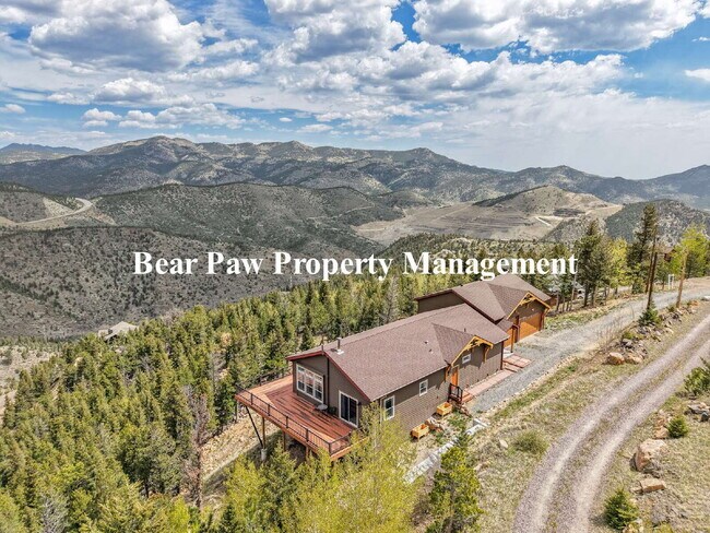 Building Photo - "Experience Mountain Living at Its Finest ...