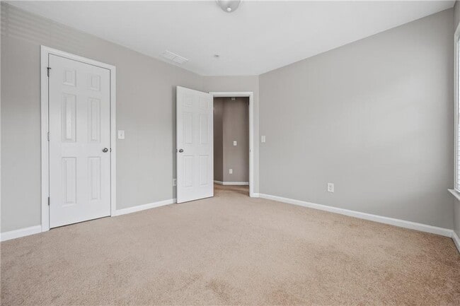 Building Photo - 4721 Creekside Villas Way