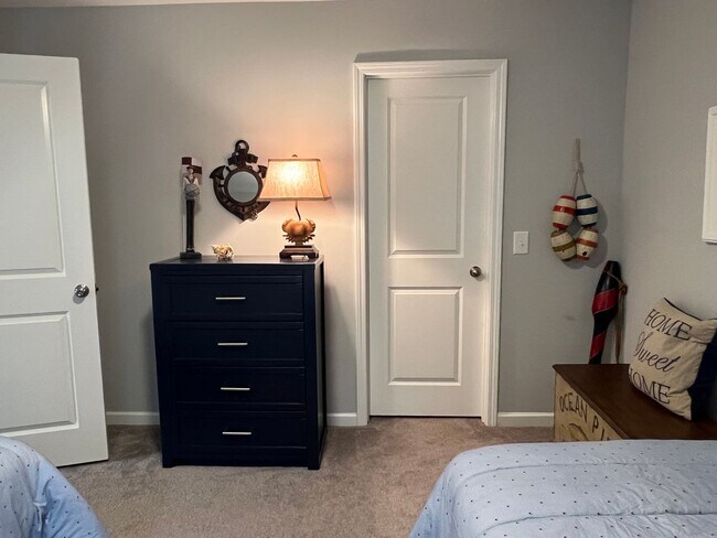 Building Photo - FURNISHED Three Bedroom Wellstone Model Home