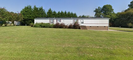 Building Photo - Charming Rural Home with Large Yard & Storage