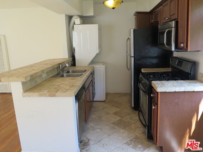 Building Photo - 12488 Gilmore Ave