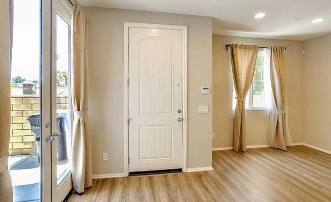 Building Photo - This gorgeous 3-bedroom, 3.5 bath townhome...