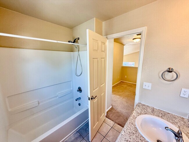 Building Photo - Spacious 4-Bedroom Home with Main level Li...