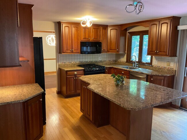 Building Photo - 4-Bedroom Home with 2 Full + 2 Half Baths ...