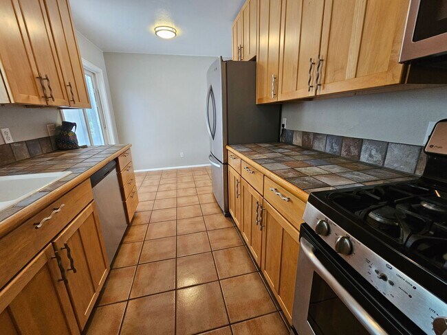 Building Photo - Virginia Village Home New Paint, Carpet, Blinds Backs up to Cherry Creek Trail