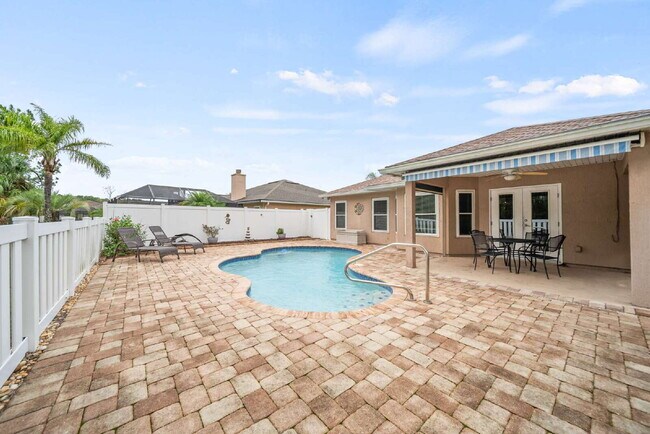 Building Photo - Luxurious Palm Coast Retreat: 4-Bed 3 Bath Pool Home