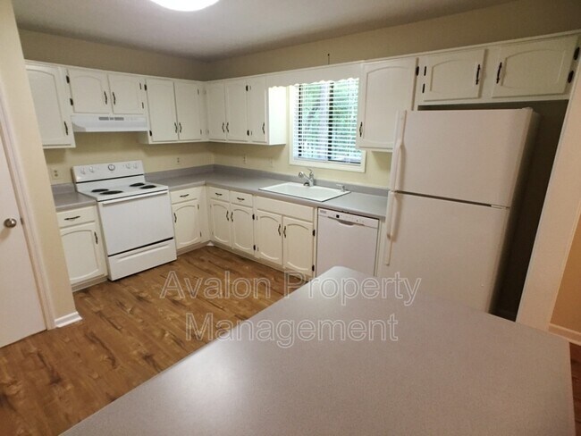 Building Photo - 5040 Woodland Dr NW