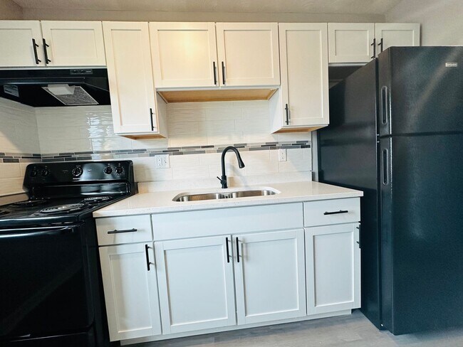 Building Photo - Experience Luxury Living at Park Harrison:...