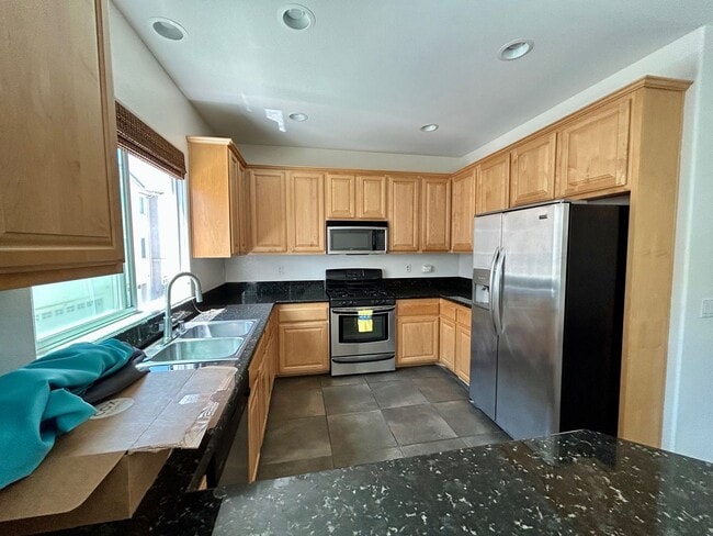 Building Photo - Spacious 3-Bedroom, 2.5-Bath Condo for Ren...