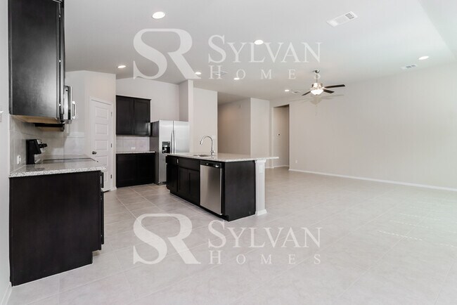 Building Photo - Turn the key. Enter. Smile. Repeat every day!