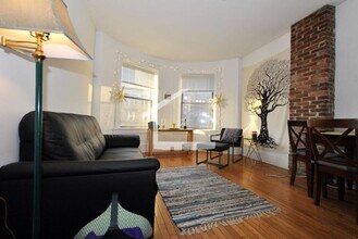 Building Photo - 4BR 2Bth unit. Great location! On T, walk to supermarket, restaurants.