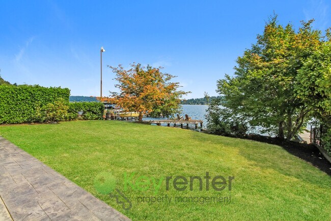 Building Photo - Waterfront Elegance with Private Dock and Designer Finishes