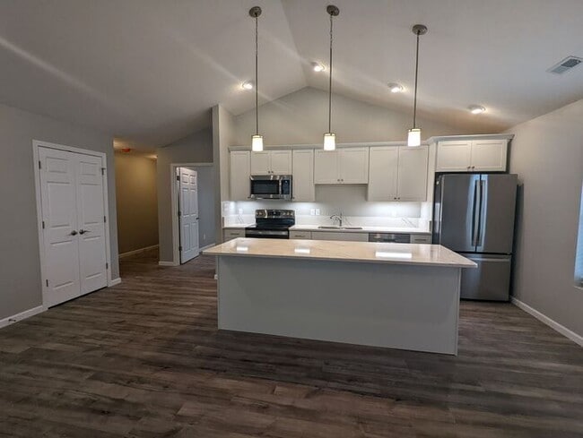 Building Photo - Experience modern living in this beautiful...
