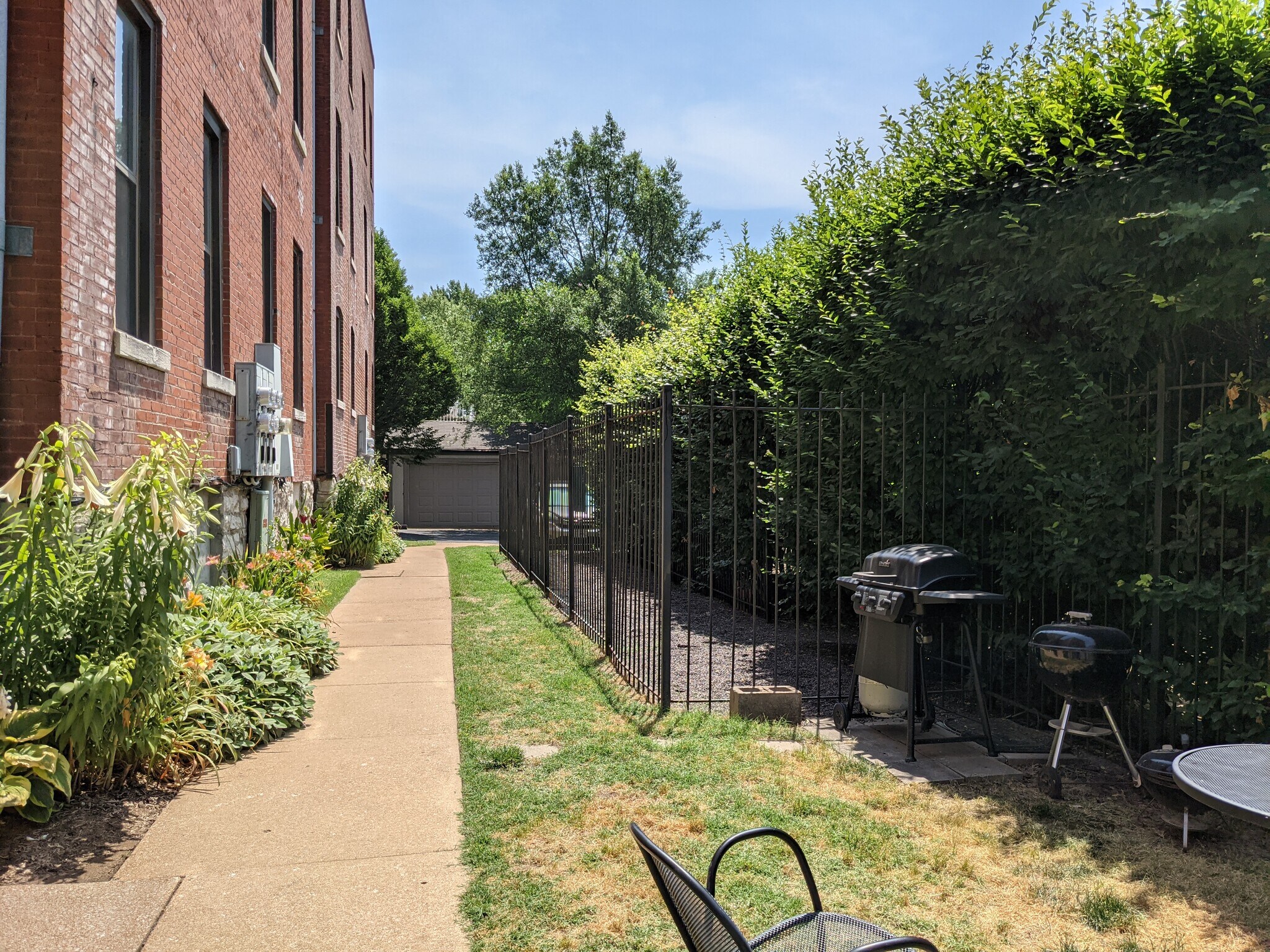Backyard space looking towards parking area - 4496 Maryland Ave