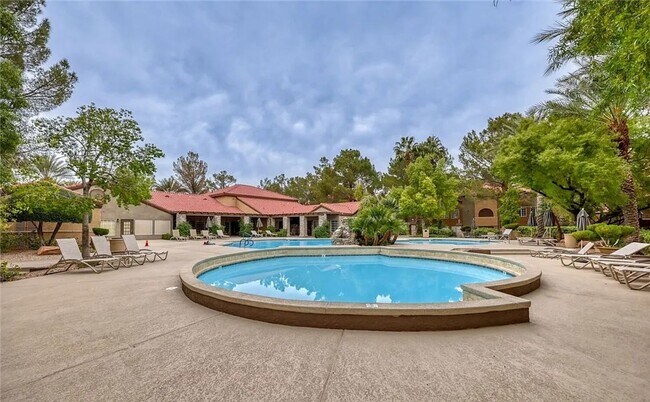 Building Photo - Spacious, Stylish Living in a Guard-Gated West Las Vegas Community in The Lakes with Resort-Style...