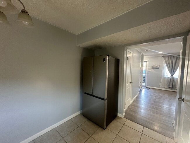 Building Photo - Centrally Located 2 BR Green Townhome with Fenced Patio