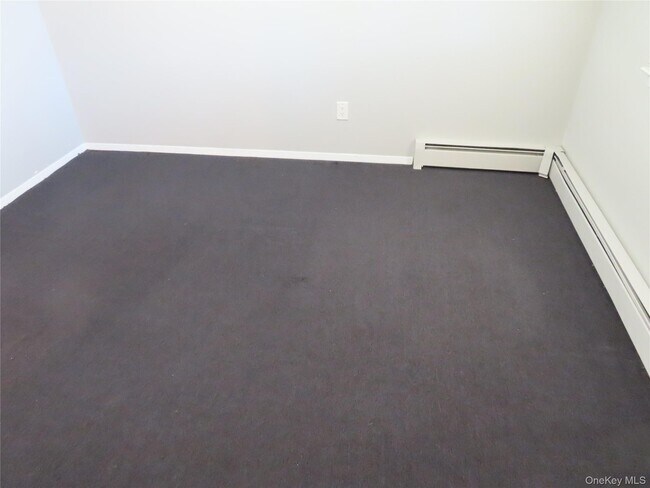 Building Photo - 1210 Smithtown Ave