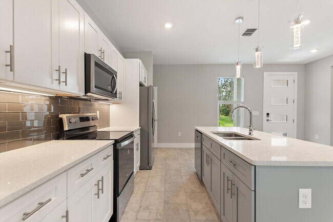 Building Photo - ONE MONTH FREE RENT! Modern, energy effici...