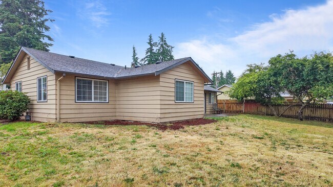 Building Photo - Charming 3BR Home with Massive Fenced in Yard