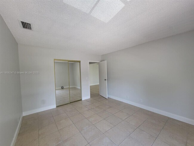 Building Photo - 5881 NW 57th Ave