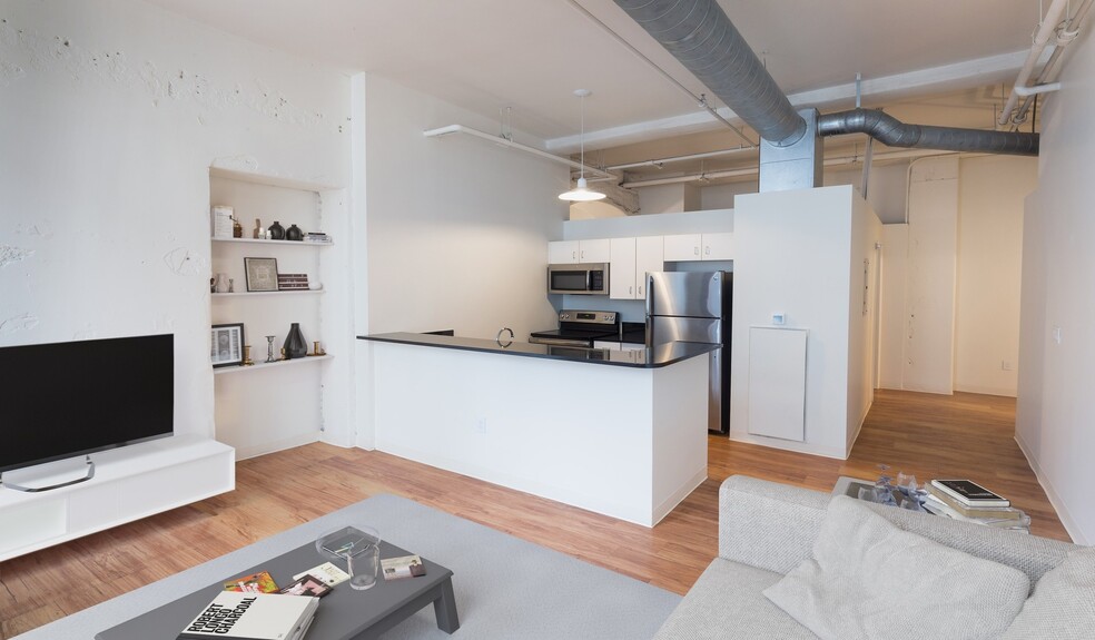Kitchen opens up to the living room - Bank Lofts