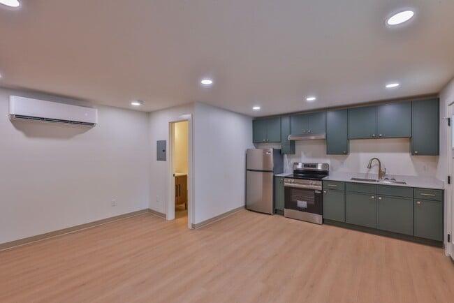 Building Photo - Modern Remodel with Designer Finishes | All Utilities Included