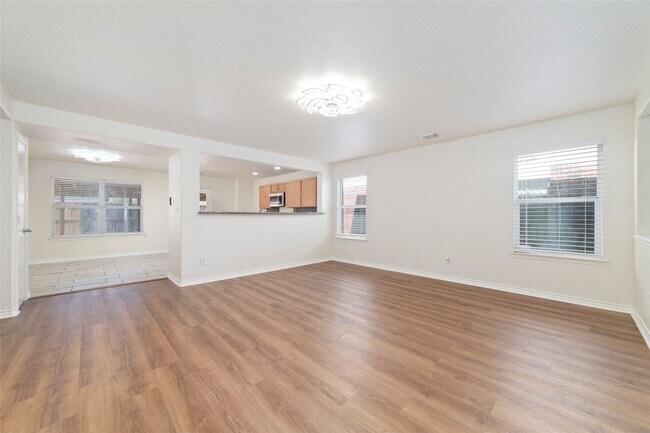 Building Photo - 8418 Village Rose Ln