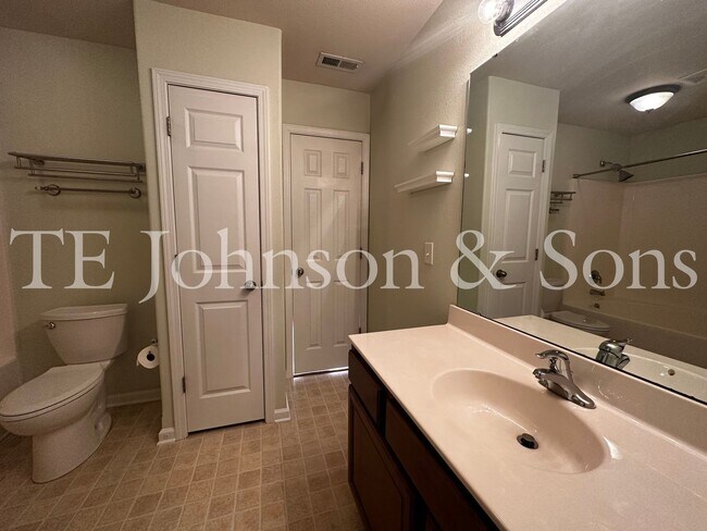 Building Photo - Spacious 3 Bedroom Home with Primary Suite on Main, Gas Fireplace & Patio in Advance!