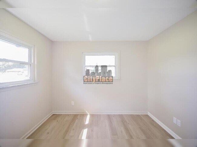 Building Photo - 7504 Honnen Dr N