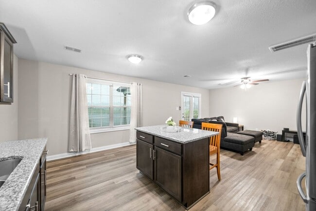 Building Photo - Stocked Pond, Walking Trails and More!!