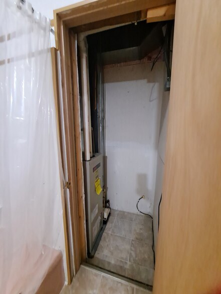 Furance closet in bathroom - 129 Main St