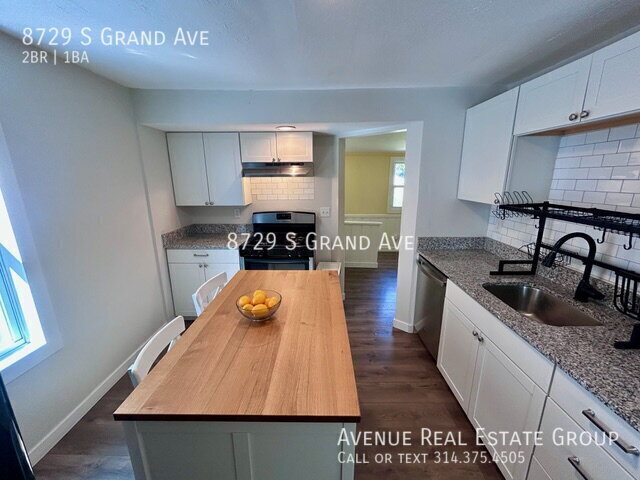 Building Photo - 8729 S Grand Ave