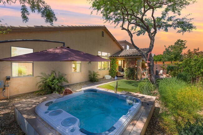 Building Photo - Spacious Mountain’s Edge Home with Den, Sunroom, 3-Car Garage & Private Spa Retreat