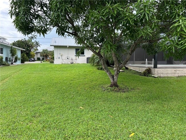 Building Photo - 6128 Cocos Dr